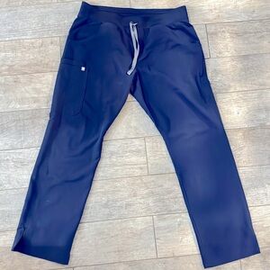 Figs size large Navy!! Soft scrub bottoms.